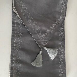 Elegant Silver Table Runner with Tassel